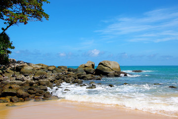 Tropical beach, boulders on the beach, Karon beach, Phuket, Thailand