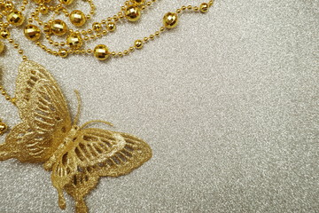 Fototapeta na wymiar Glitter Butterfly Decoration with space copy on silver glitter background