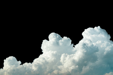Pure white cumulus clouds on black background. Cloudscape background. White fluffy clouds on dark background. Soft cotton feel of white clouds texture isolated on black background with copy space - obrazy, fototapety, plakaty