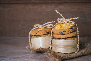 Cookies on a wooden table have space to put text