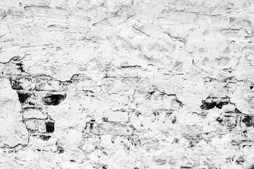 Texture of a concrete wall with cracks and scratches which can be used as a background