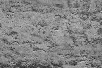Texture of a concrete wall with cracks and scratches which can be used as a background