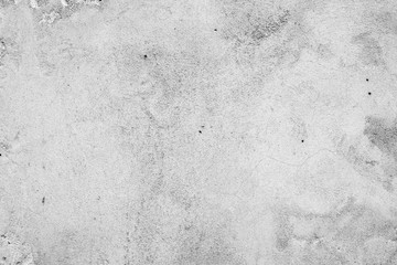 Texture of a concrete wall with cracks and scratches which can be used as a background