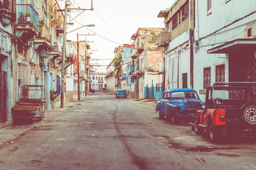 Vintage colored classic american cars in Old Havana, Cuba.