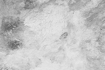 Texture of a concrete wall with cracks and scratches which can be used as a background