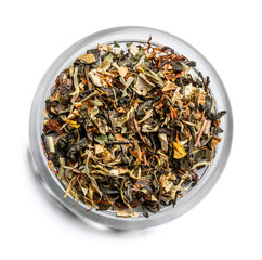 Green tea with aromatic additives. Top view on white background