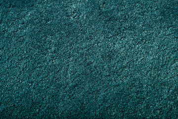 Carpet covering background. Pattern and texture of blue carpet. Copy space.