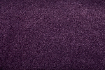 Carpet covering background. Pattern and texture of Violet colour carpet. Copy space.