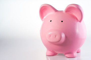 Piggy Bank on White Background with Copy Space
