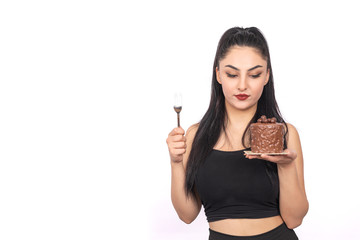Naklejka premium girl eating cake on white background