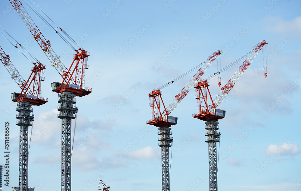 Wall mural crane of the construction spot of the development district