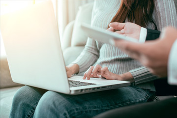 Fototapeta premium young woman working on her laptop at home