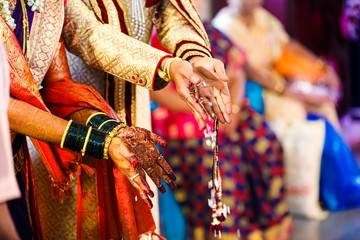 Indian traditional wedding ceremony bridal and groom hand 