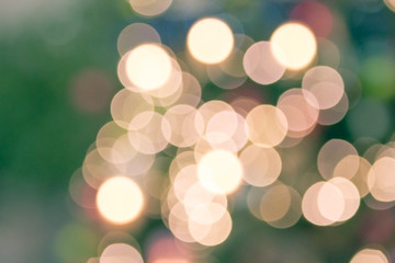 gold color christmas bokeh with defocused lights