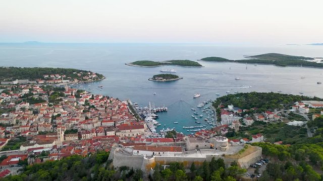 Panning aerial drone shot overlooking Spanich Fortress on Island of Hvar, Croatia