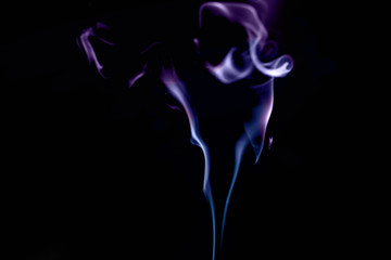 Fototapeta premium abstract violet colour smoke on black background