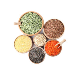 Different types of legumes and cereals on white background, top view. Organic grains