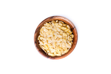 Handful of white dried dehydrated melon seeds pasta replacement