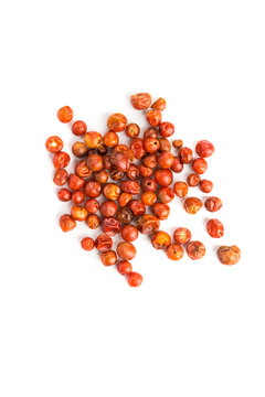 Handful of red spicy tiny round chile tepin peppers