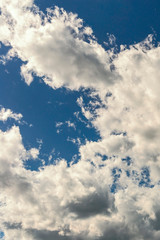 Beautiful blue sky with white clouds as a natural background.