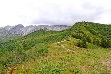 Obraz premium Beautiful mountain landscape in French Alps. Hike on passes Annes and Oulettaz