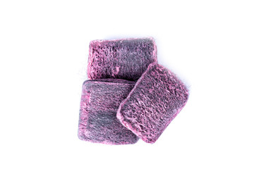 Square pink soap filled steel wool scrub pads