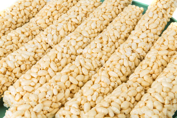 Several puffed plain round rolled rice snacks