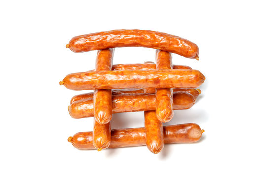 Thin sausages isolated on white background. Hunting sausages