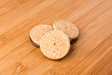 Several tasty hispanic sandwich snack cookies stacked together