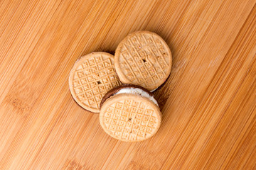 Several tasty hispanic sandwich snack cookies stacked together