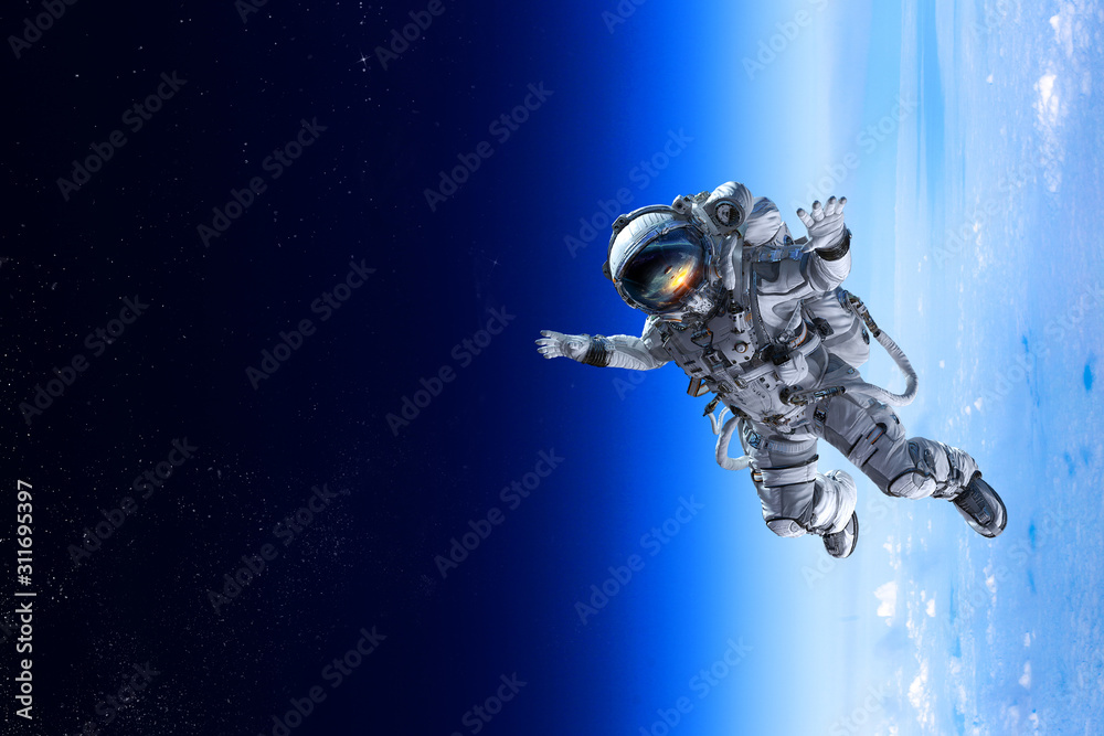 Wall mural exploring outer space. mixed media