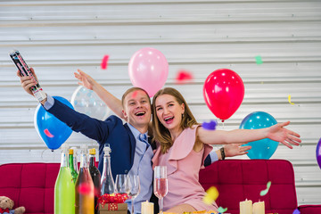Fototapeta premium A happy young man and woman in Happy new year.