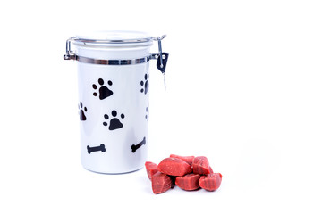 Grey doggy treat container with black pawprints and red meat snacks