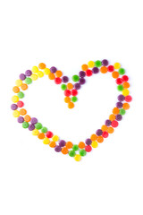 Assortment of varied colors and flavors hard candies formed in a heart frame
