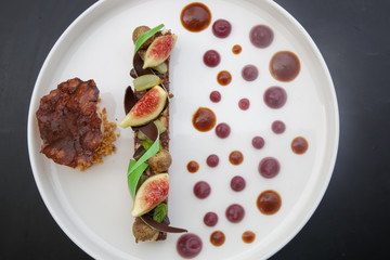 Fancy modern dessert on the white tray, Exquisite dish, creative restaurant meal concept, haute couture food
