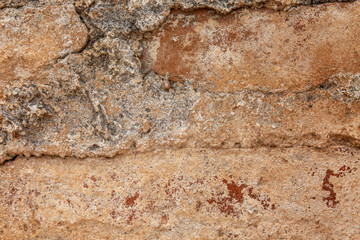 Texture of a brown bricked-up wall. Space for text. Background.