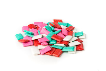 Red green pink and white assorted flavors chicle gum pieces