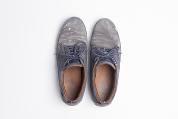old dirty sneakers above isolated