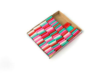 Red green pink and white assorted flavors chicle gum pieces