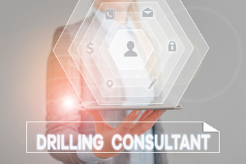 Conceptual hand writing showing Drilling Consultant. Concept meaning onsite supervision of daytoday drilling operations