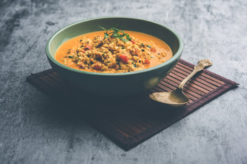 Paneer Bhurji Gravy served in a bowl. selective focus