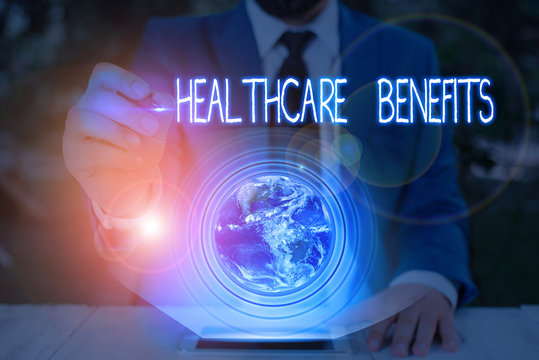 Conceptual hand writing showing Healthcare Benefits. Concept meaning use the health services without risk of financial ruin Elements of this image furnished by NASA
