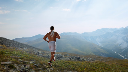 Naklejka premium Sportsman running race. Mixed media