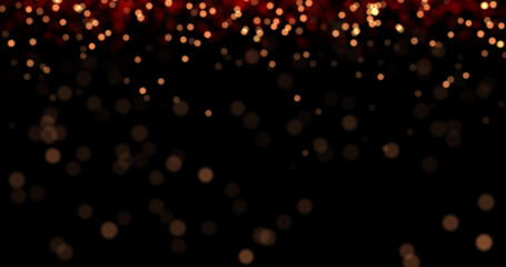 Flying dust particles on a black background