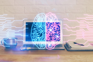 Multi exposure of work table with computer and brain hologram. Brainstorm concept.