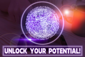 Writing note showing Unlock Your Potential. Business concept for release possibilities Education and good training is key Elements of this image furnished by NASA
