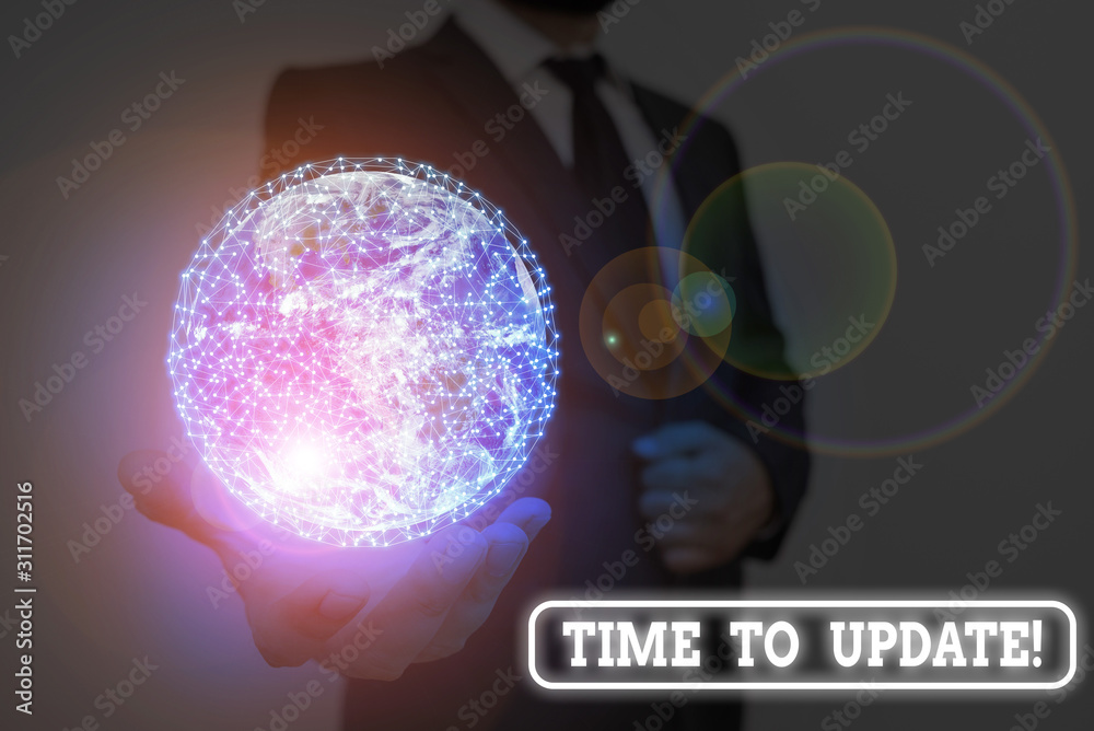 Wall mural writing note showing time to update. business concept for this right moment to make something more m