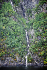 Fototapeta na wymiar magnificent view of the waterfalls plunging into the Norwegian fjords