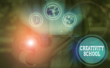 Writing note showing Creativity School. Business concept for students are able to use imagination and critical thinking Elements of this image furnished by NASA