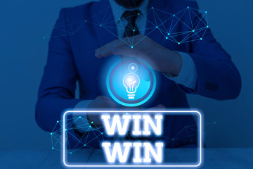 Conceptual hand writing showing Win Win. Concept meaning of or denoting a situation in which each...